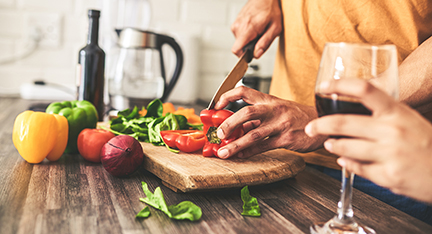 Cropped shot of an unrecognizable man cooking in the kitchen at home